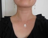 Lotus flower cutout charm - silver over bronze charm on sterling silver chain. Charity benefit.