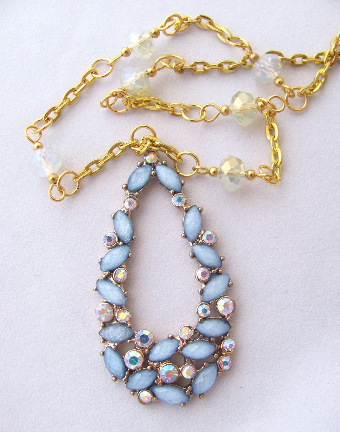 Sky Blue and Rhinestone Pendant on Gold Chain with Faceted Glass Embellishments