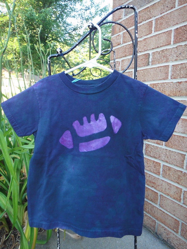 Kids T-Shirt: Black with Purple Batik Football, Short Sleeves (5/6) READY TO SHIP