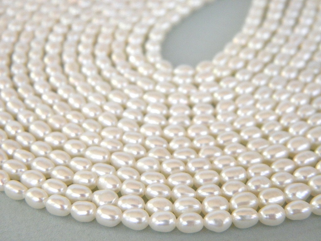 Grade AA White Freshwater Pearls 3mm x 4mm Rice Pearls Full Strand Cultured