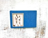 vintage book picture frame. READABLE vintage book as unique photo frame. Genesis in Space and Time, 1972. cobalt sky blue bible history