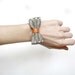 Handpainted bow bracelet, brown with orange detail- Leather bracelet, tribal painting - Adjustable