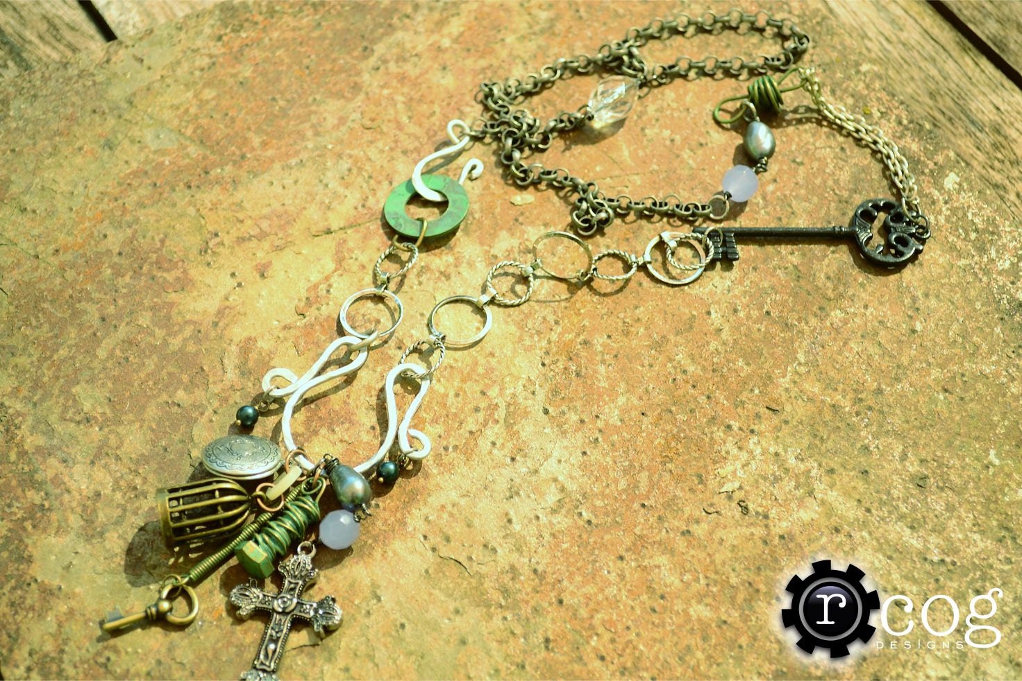 Long Cross Assemblage Necklace: Hodge Podge of Unique Charms and Bobbles