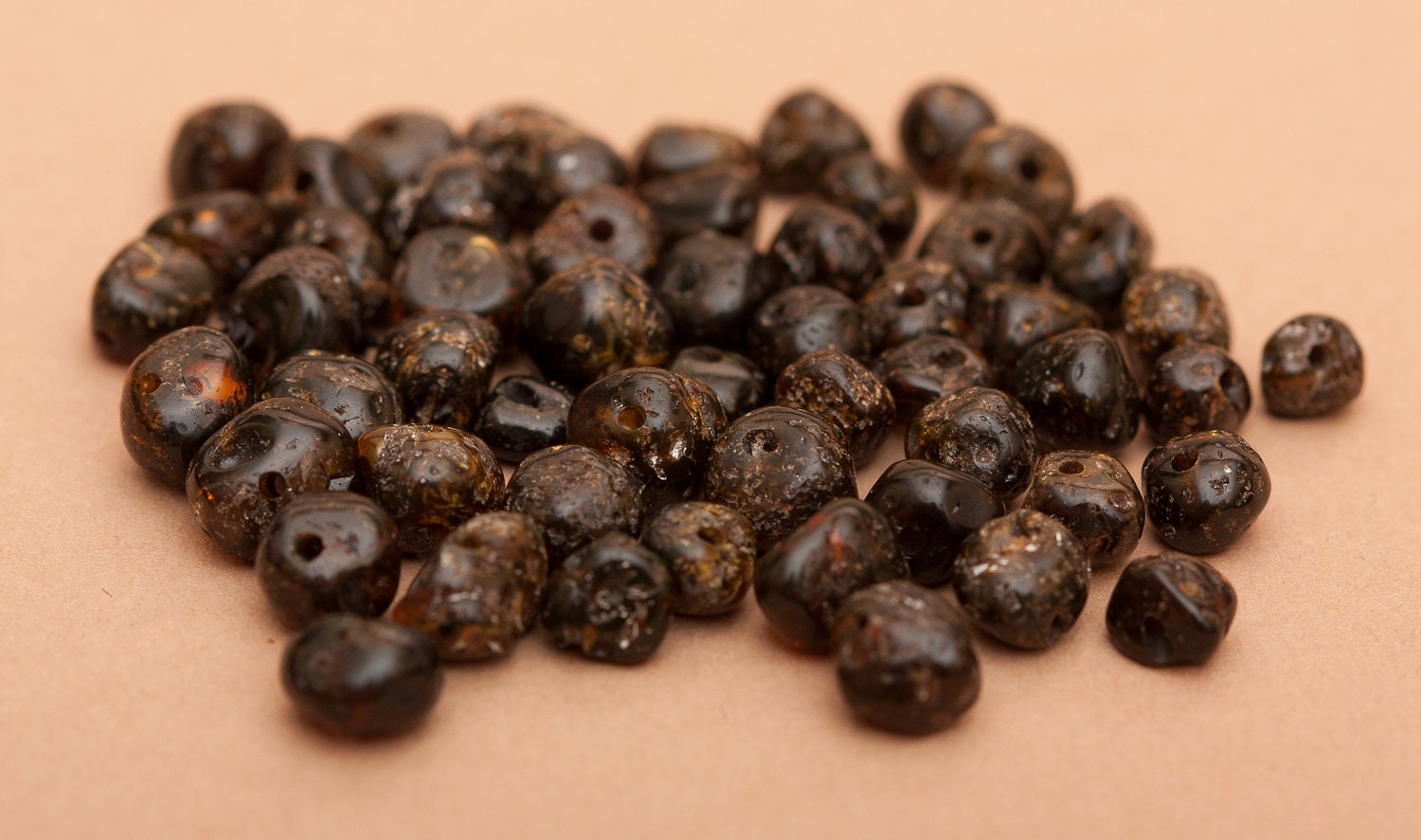 50 pcs of Baltic Amber loose beads with drilled hole.