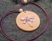 Wooden necklace / pendant.  Pink and silver Dragonfly on a Beech disc pendant