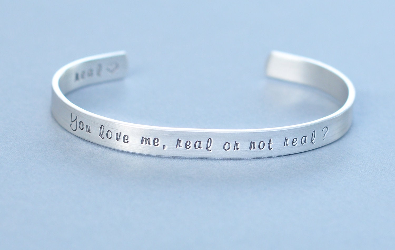 Hunger Games inspired- Hand Stamped bracelet - You love me, real or not real -
