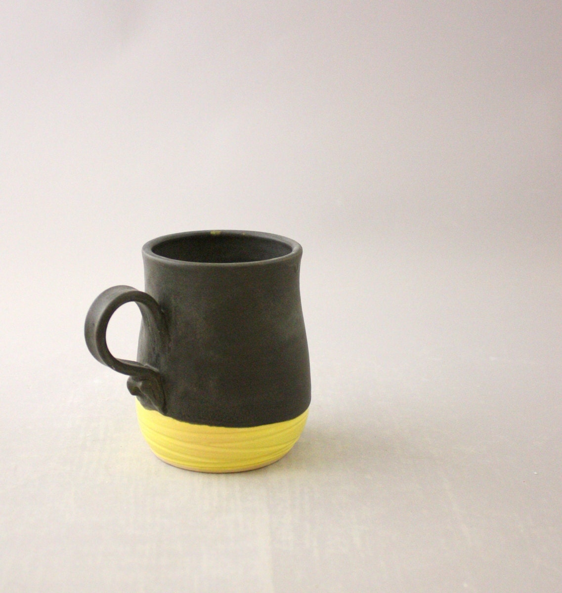 Ceramic Coffee Mug in Graphite Gray and Lemon Yellow by Nstarstudio