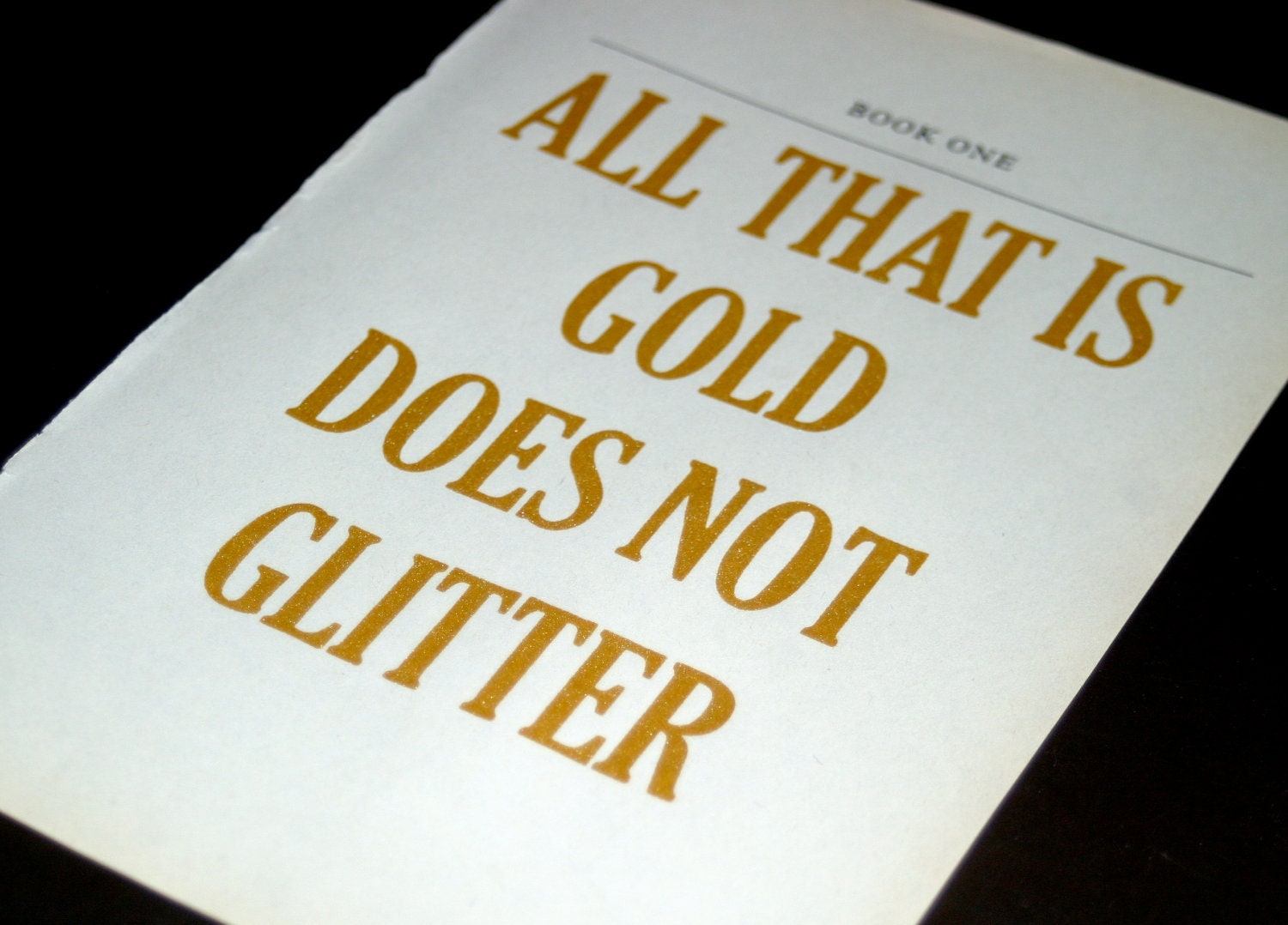 All that is gold does not glitter - J.R.R. Tolkien quote on The Fellowship of the Ring book page