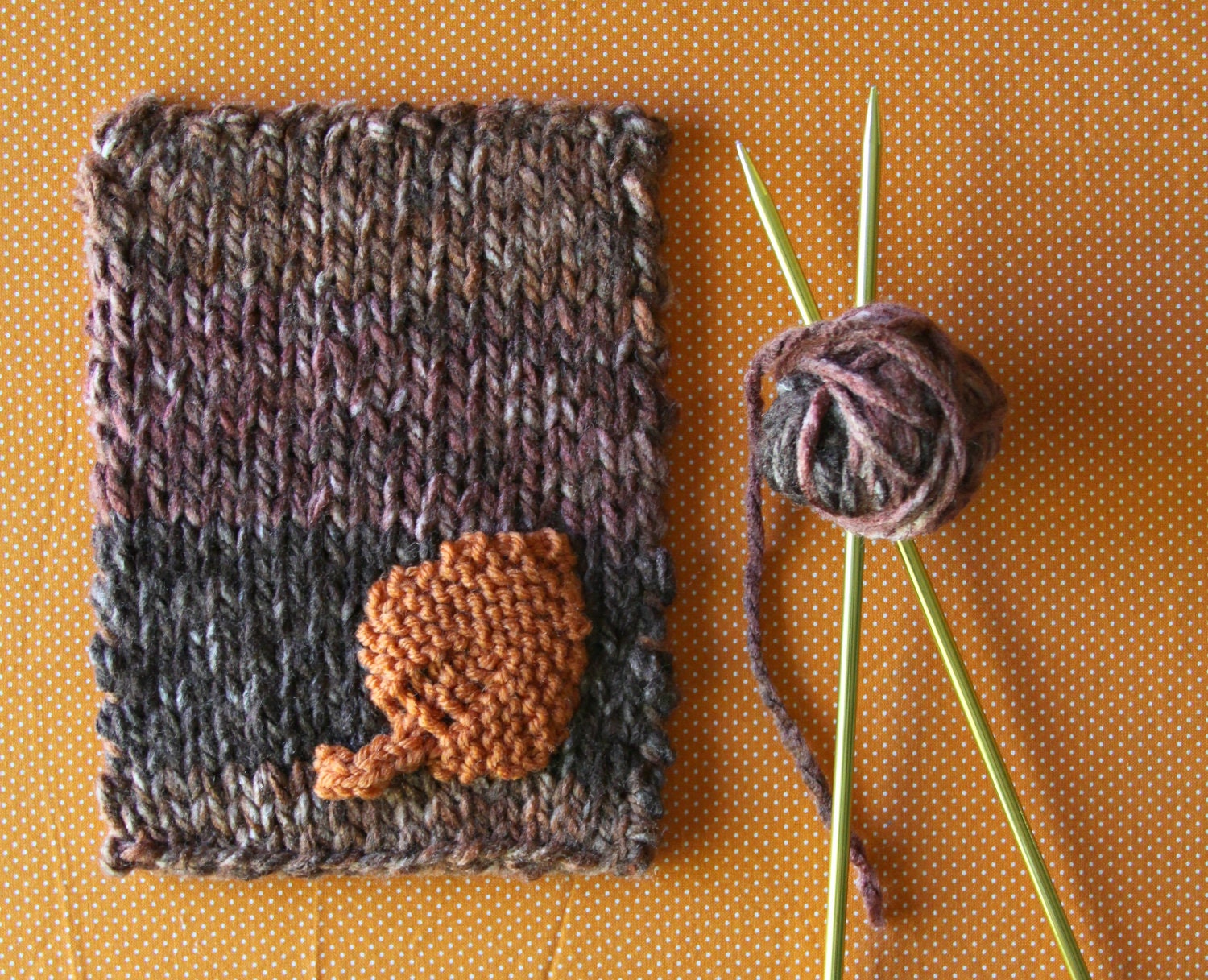 Knitted Postcard No. 20 - Brown stripes with orange leaf