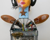 Take Your Wings And Soar recycled found object mixed media sculpture
