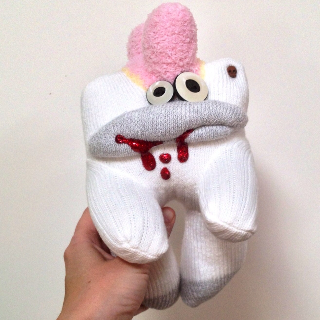 Checkmate-- A Sock Zombie with a Pink Fuzzy Toehawk