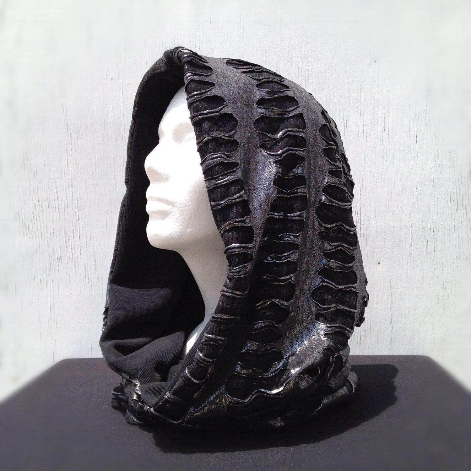 Silver mesh and black reversible hood, great for the desert or other festivals