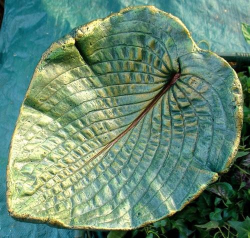 A cast leaf Hosta - a Cement/concrete fossilized birdbath / feeder on a pole (Leaf 1068B) - deep green with gold and copper highlights