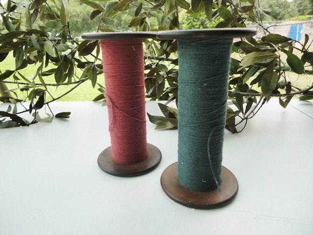 Vintage textile spools with tread