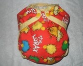 One size AI2 cloth diaper cover made from The Lorax fabric