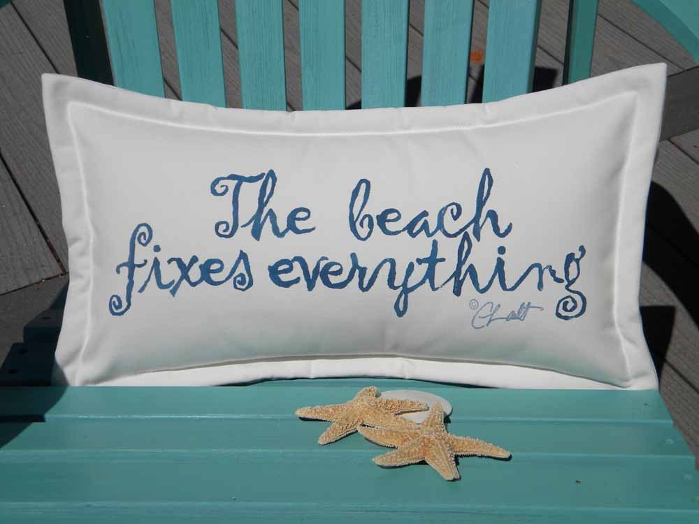 The BEACH FIXES EVERYTHING outdoor pillow your choice of lettering color on white background 12"x20" Crabby Chris Original - crabbychris