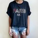 Vintage Charcoal Gray PARIS x FILA font Embroidered T Shirt - XL