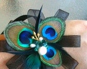 Unique Peacock feather corsage-Lets customize this pin up and or wrist corsage to fit right into your special day