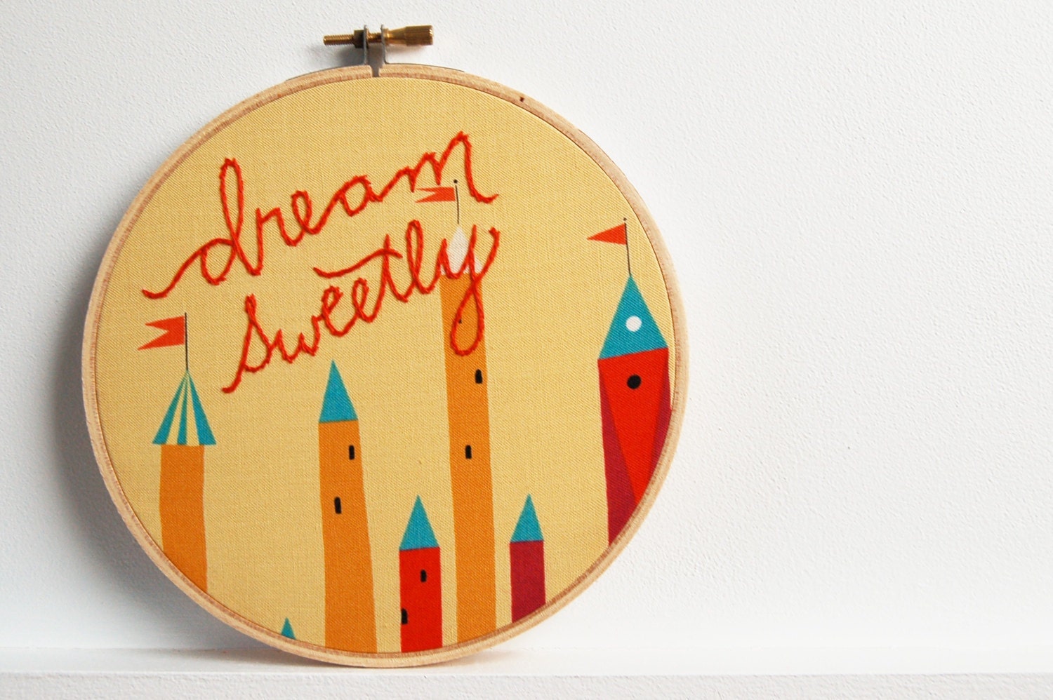Nursery Decor, Embroidery Hoop Art. "Dream Sweetly" Stitched in Red on Fairy Tale Fabric, 6 inch Hoop. by merriweathercouncil on Etsy
