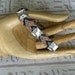 Rhinestone studded friendship bracelet.