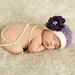 Newborn vintage style hat for dressing up baby girl's photos with deep purple flower and pearls in center -- also beret style