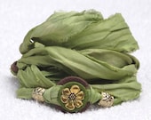 Sari Silk Whirly Wrap bracelet in celery and chocolate Antique brass blossom and easy magnet clasp