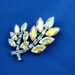 Vintage AB Rhinestone Brooch. Signed B David, Highly Colorful Irredescent Aurora Borealis and Baby Blue Rhinestones.