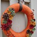 Burnt orange yarn wrapped wreath sage green, maroon, brown and gold