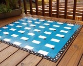 blue and white checked floorcloth, black and white polka dot border, canvas art for your floor