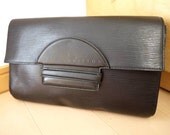 Early 90s Vintage Louis Vuitton rare epi black clutch. One of the rarest epi vintages.