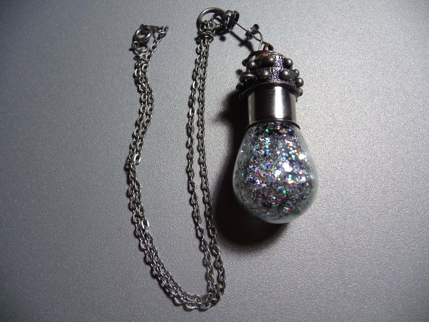 Vintage Light Bulb Filled with Silver Glitter Flakes necklace by vintagerust