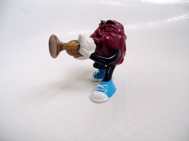 Vintage 1980's California Raisin playing Trumpet