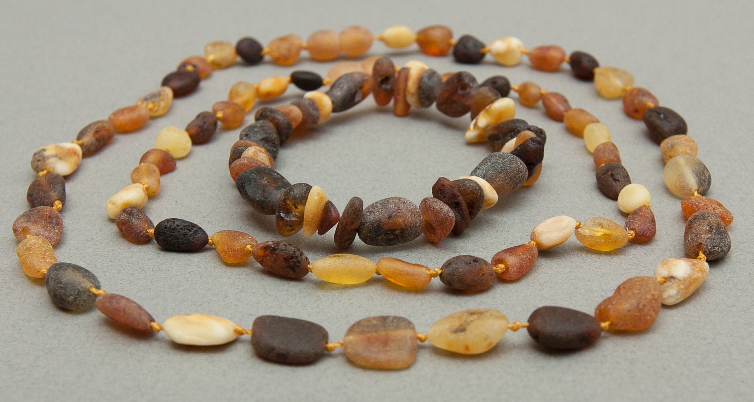 Unpolished Baltic Amber teething necklace for baby and necklace plus bracelet for mommy.
