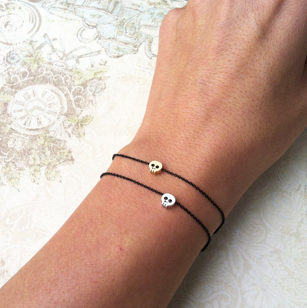 tiny skull bracelet - matt 14kt gold plated skull on BLACK chain