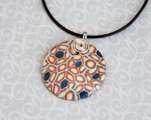 SALE. Polymer clay pendant necklace. Wire wrapped. Black leather cord.