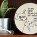 Dinosaur Eats It Hand Embroidery - 8" Hoop