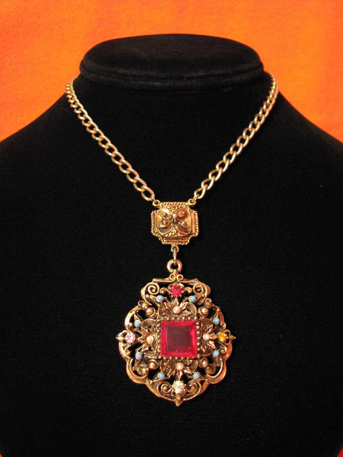 Antique Victorian Gold Tone White Faux Pearl and Red Ruby Crystal Glass Diamond Rhinestone Filigree Amulet Medallion Necklace