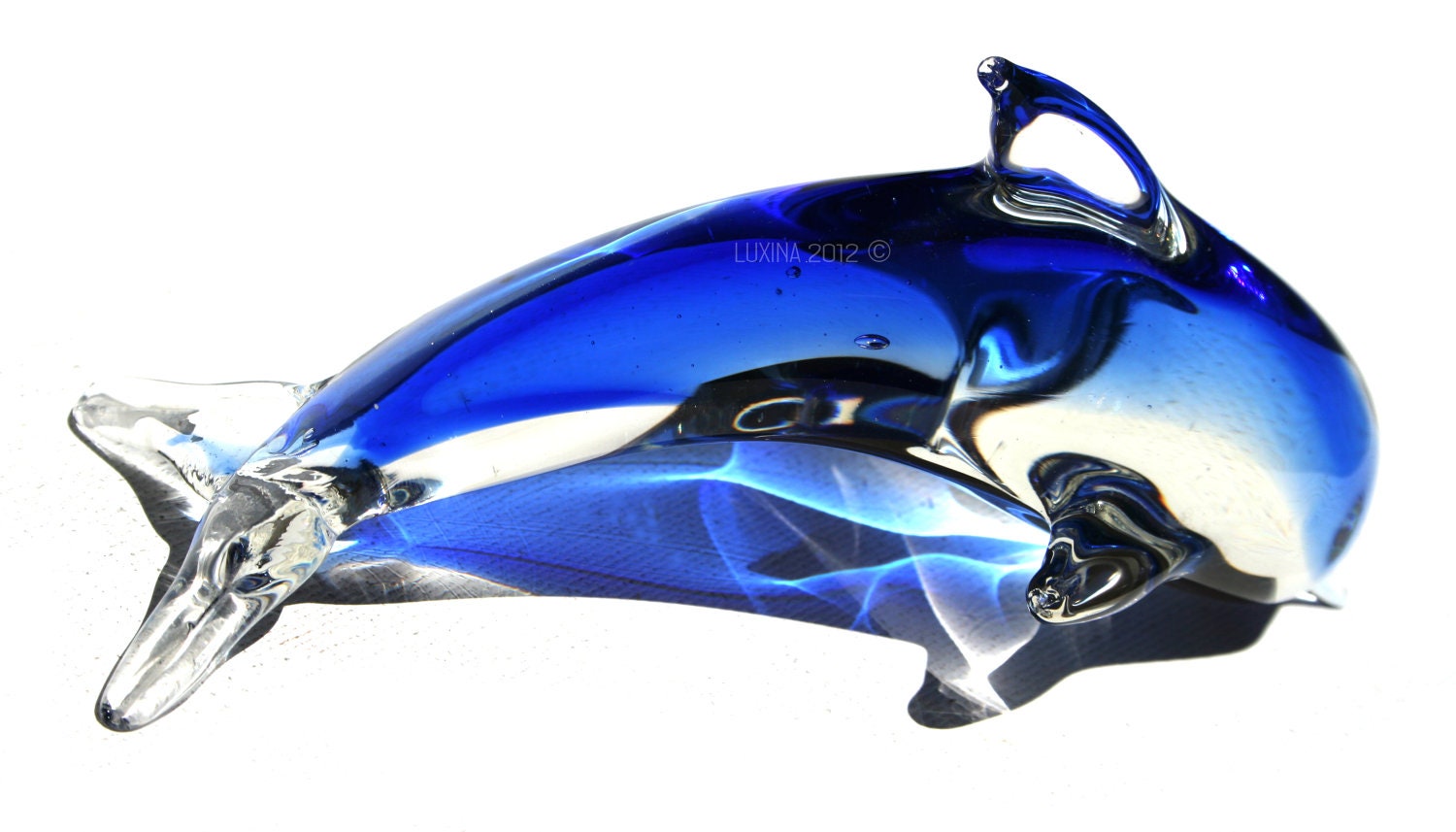 dolphin glass statue