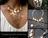 Handmade beautiful peach yellow cream charm necklace with crystal accents and gold layered tangled chains