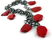 Stylish Chic Hip Necklace. Red coral , metal  over sized metal  chain, long, asymmetrical  by Fashion Brand  Faina.