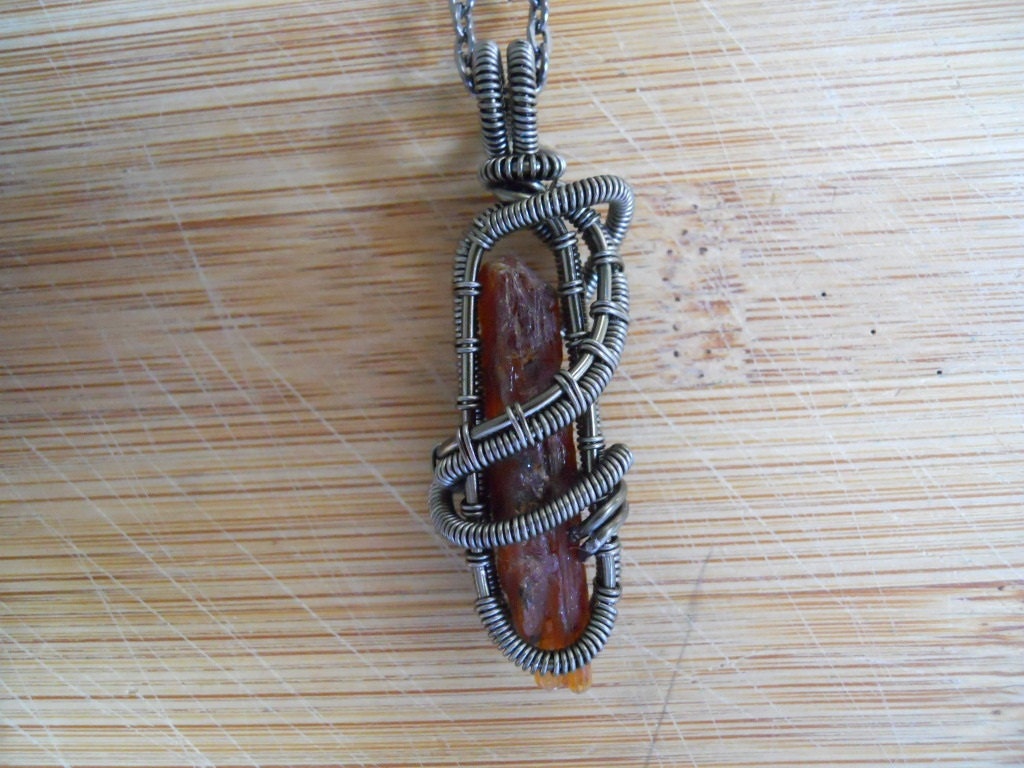 Orange Kyanite Pendant Stick Wire Wrapped in Gun Metal Parawire