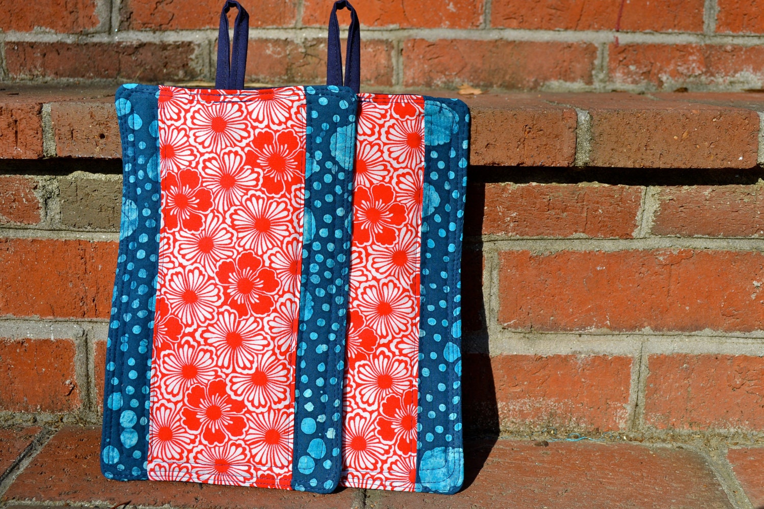 red white and blue potholders, patchwork potcholders, blue batik, red flowers