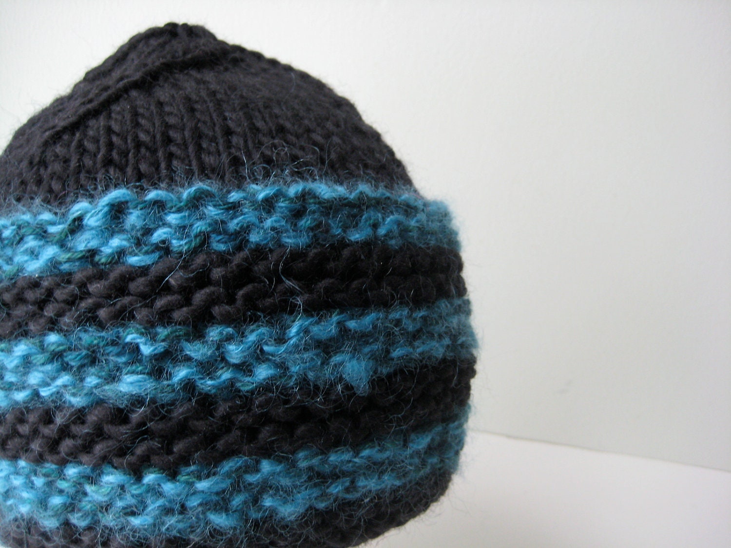 hand knit black and turquoise hat