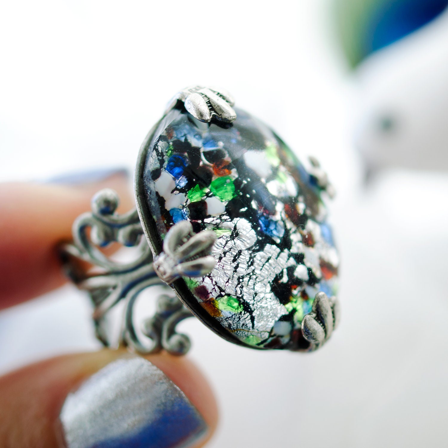 harlequin ring. featuring vintage silver blue green art glass.