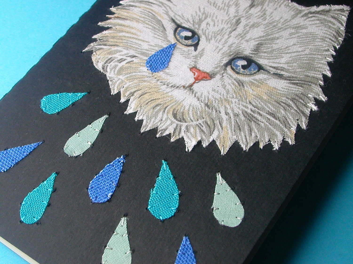 weeping kitten pocket journal