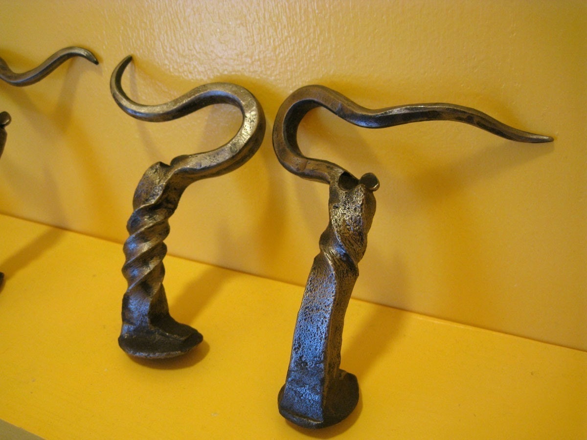 Churchkeys forged from railroad spikes - Bottle openers by a Blacksmith