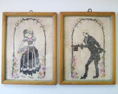 Victorian couple. Pair of vintage framed needlework pieces.