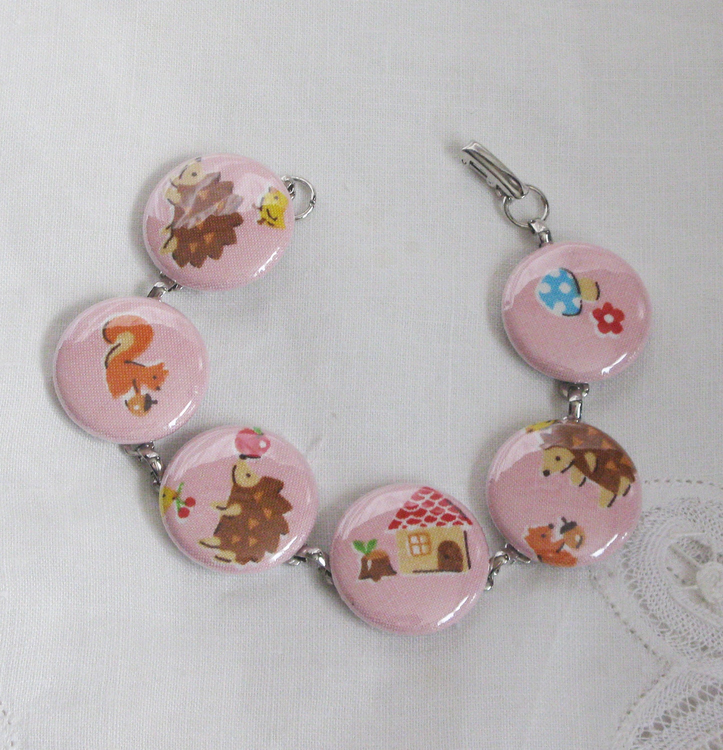 bracelet cute hedgehog and friends on  pink fabric covered one inch buttons bracelet 8 inches