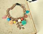vintage style. charm bracelet. beach. boho. anthropologie. flowers. gold.