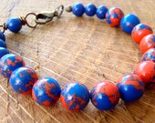 C105 Orange and Blue Beaded Bracelet